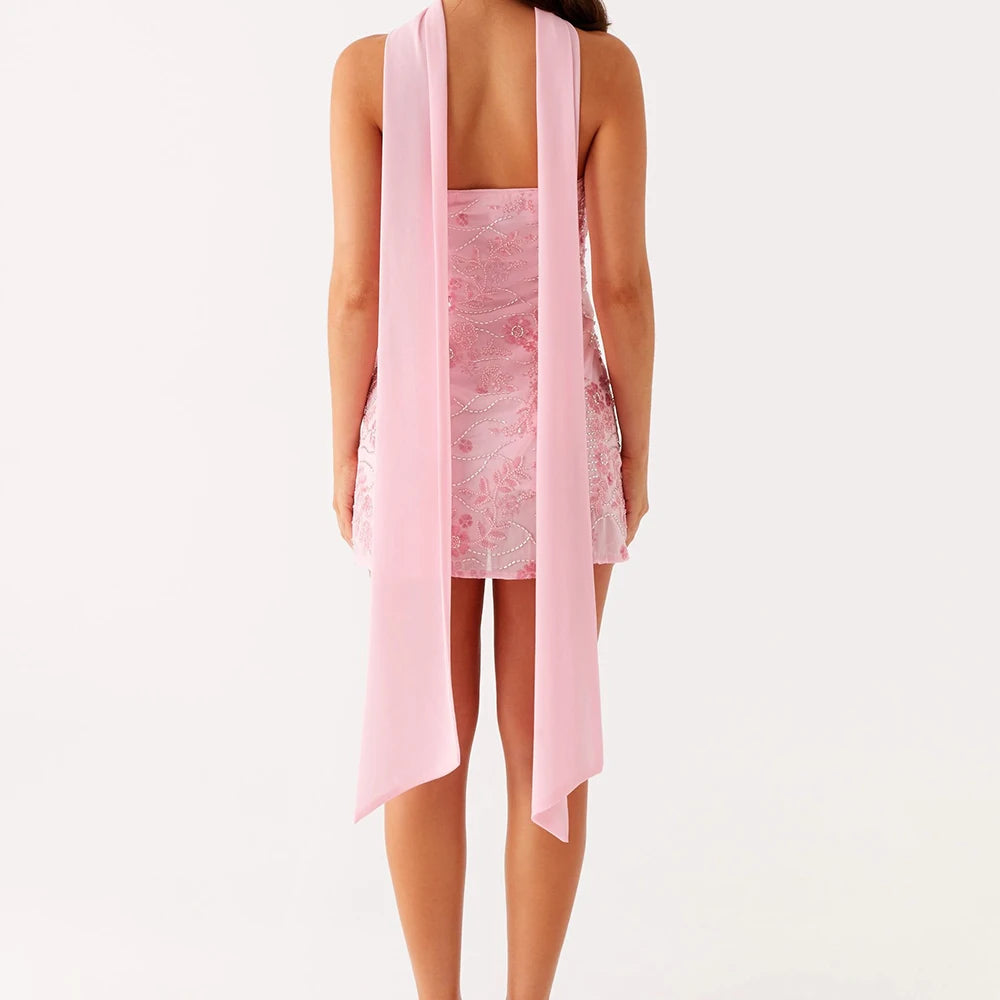 Pink lace dress with a matching pink scarf