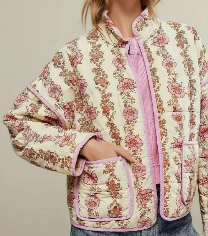 Floral patterned quilted jacket with pink accents