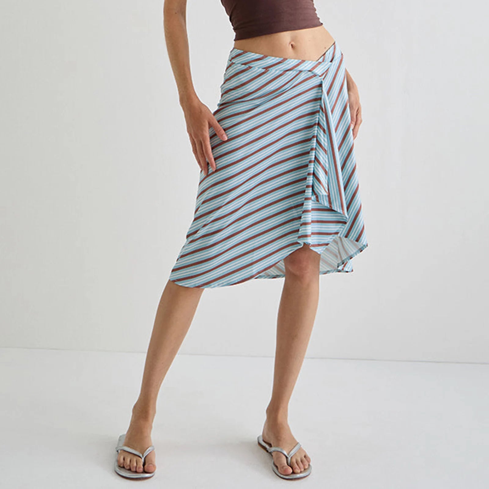 Person wearing a blue striped skirt