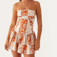 Women's corset tube pleated mini dress with backless detail.