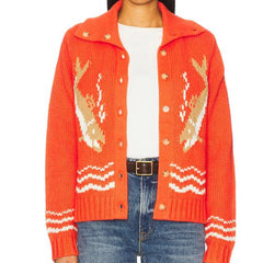 Orange sweater with fish pattern worn by a person