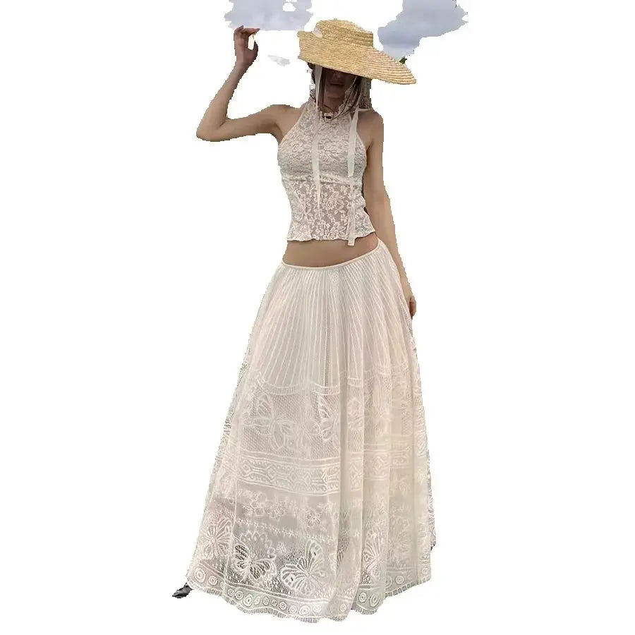 Woman wearing a beige lace dress and hat