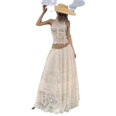 Woman wearing a beige lace dress and hat