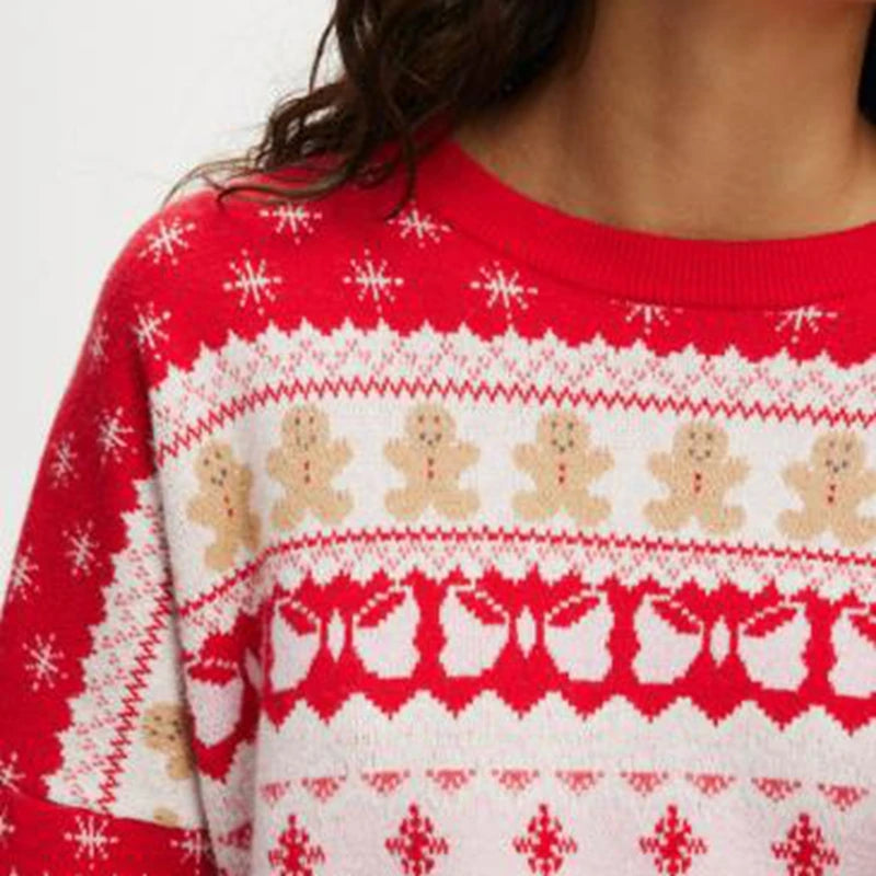 Red sweater with gingerbread man and snowflake pattern