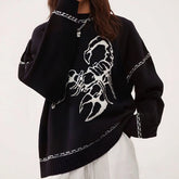 Black sweater with a white scorpion design on a white background