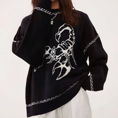 Black sweater with a white scorpion design on a white background