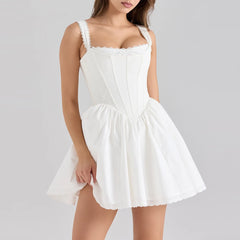 Women's white solid mini dress with a corset bodice and ruffled straps.