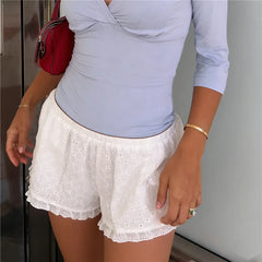White Elastic Waist Eyelet Embroidery Ruffled Hem Shorts