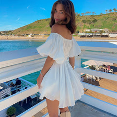Women's off-shoulder ruched A-line mini dress with puff sleeves.