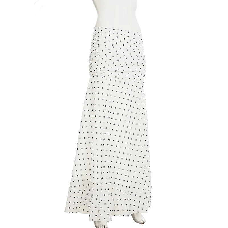 White skirt with black polka dots on a mannequin against a white background