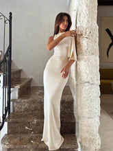 Women's one shoulder tie-up long dress with an asymmetrical neckline and fit-and-flare silhouette.