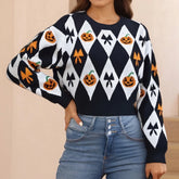 Person wearing a Halloween-themed sweater with pumpkins and bows
