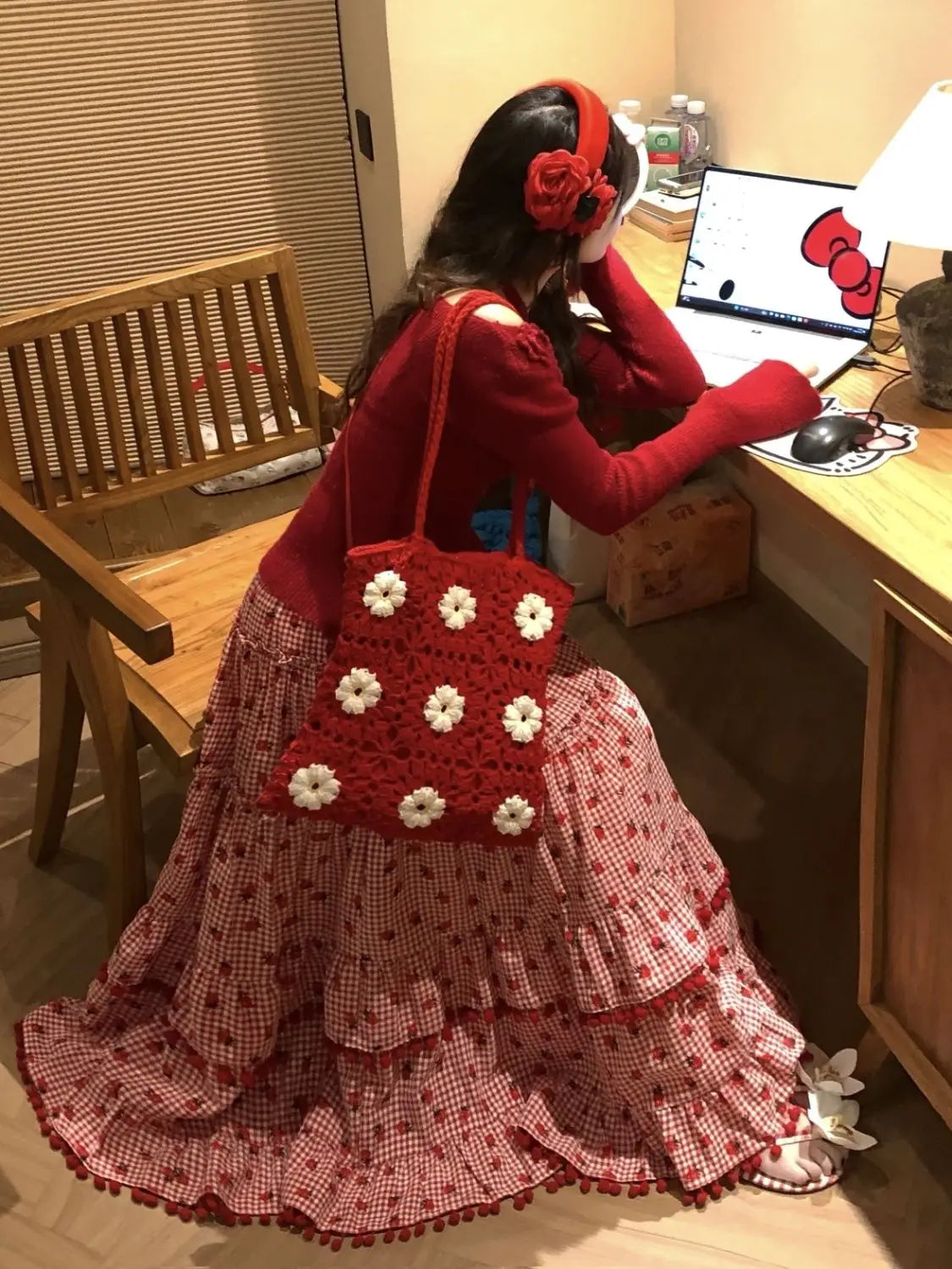 Women's red strawberry print tassel long skirt with tiered ruffles.