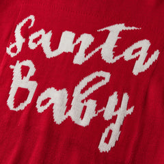 Red fabric with white embroidered text 'Santa Baby'
