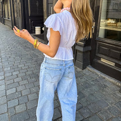 White Peplum Flare Sleeve Blouse