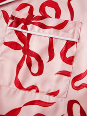 Bow Print Satin Button Up Top And Ruffled Hem Shorts Pajama Set