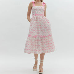 Women's printed tiered midi dress with square neck.