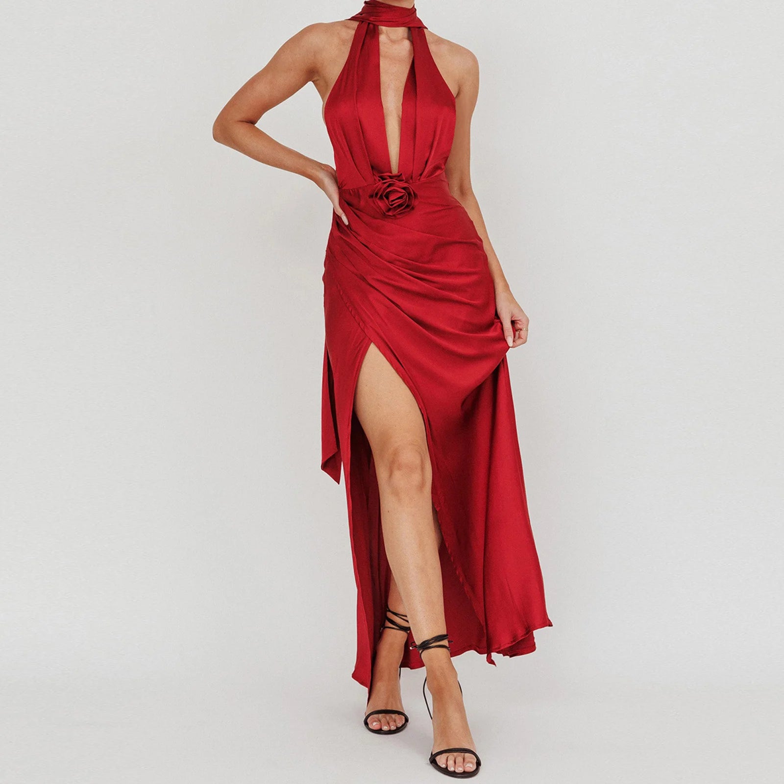 Red halter neck dress with a high slit