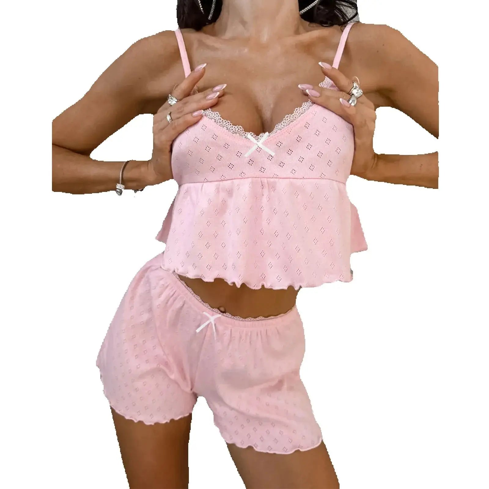 Pink lace lingerie set with shorts on a white background