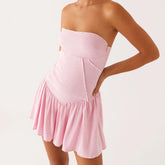 Women's corset tube pleated mini dress with backless detail.