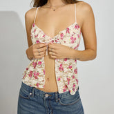 Woman wearing a floral crop top and jeans