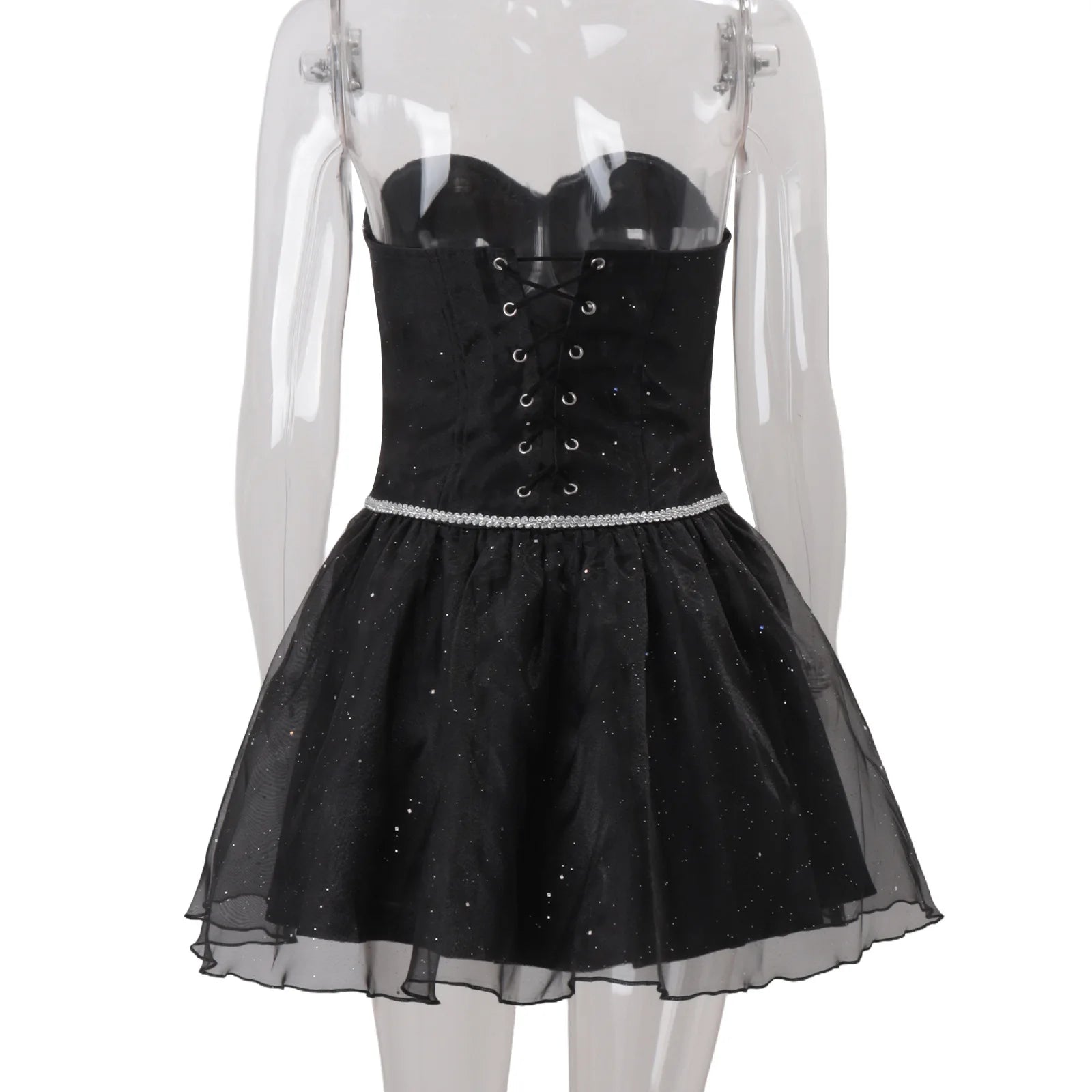 Black corset dress with sheer skirt on a transparent mannequin