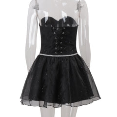 Black corset dress with sheer skirt on a transparent mannequin
