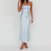 Woman wearing a light blue strapless gown - tube dress