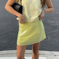 Women's sequin mesh mini skirt with a hot sweet pencil silhouette.