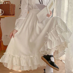 Women's ruffles lace trim bow maxi skirt in black or white.