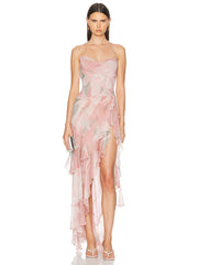 Woman wearing a pink floral dress on a white background