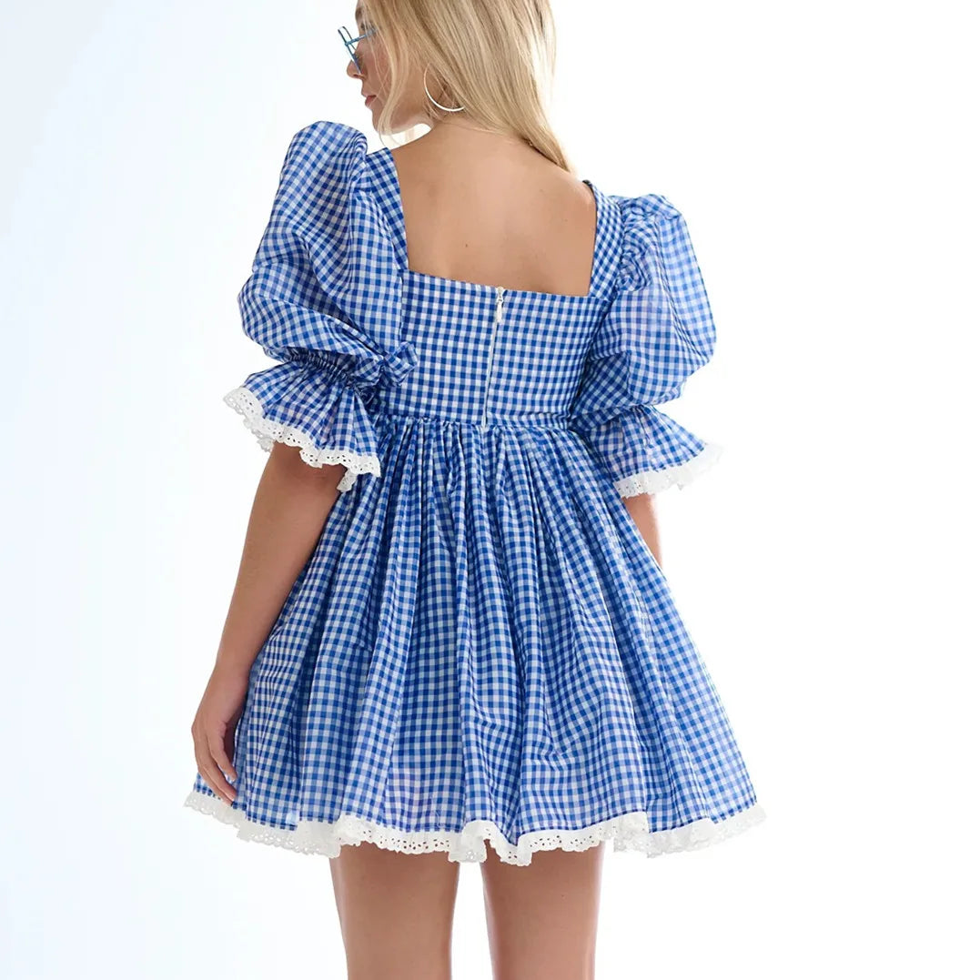 Blue and white checkered dress with puffed sleeves