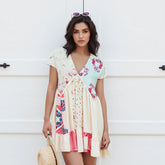 Woman wearing a floral dress - front view