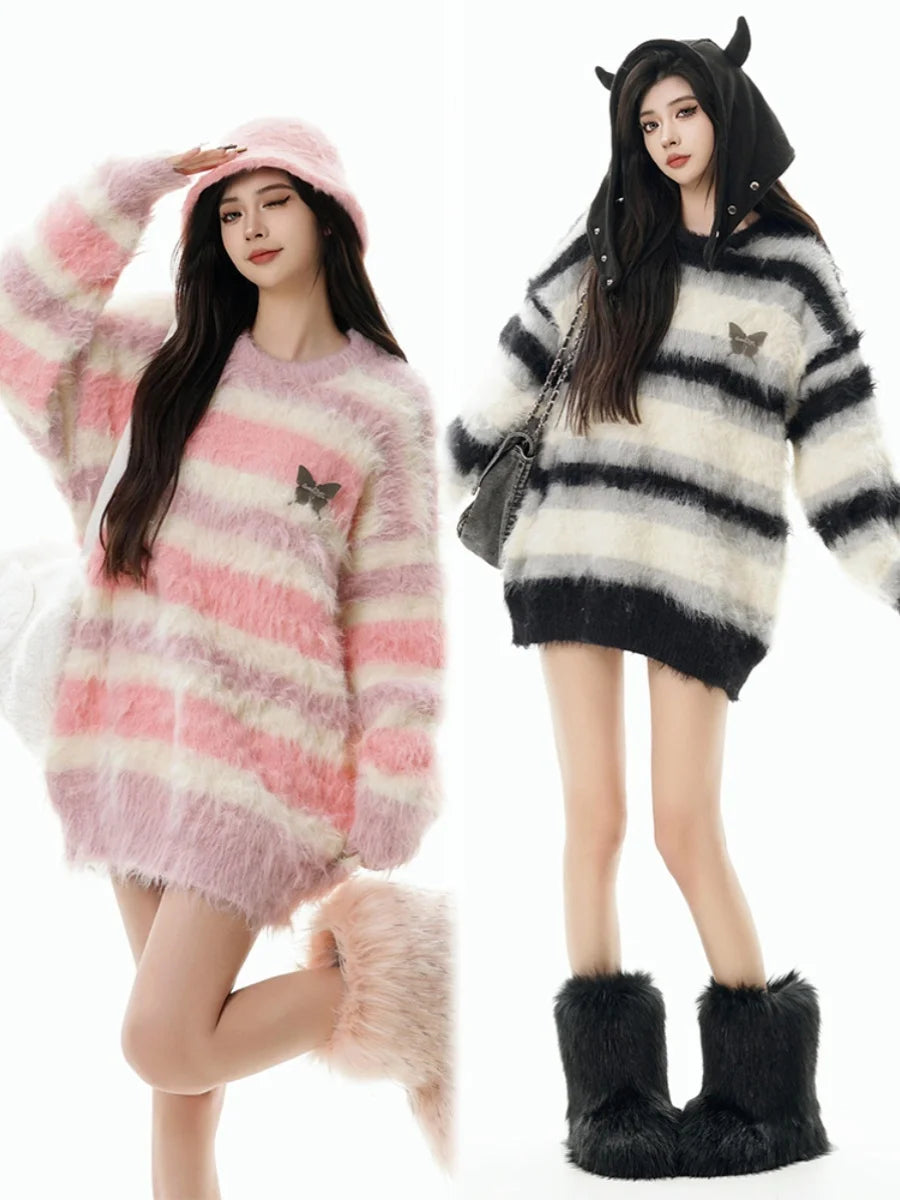 Two women wearing fluffy sweaters and boots