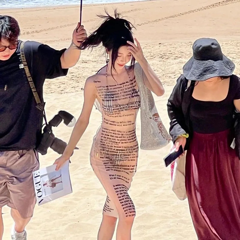 Women's letter print transparent mesh tank mini dress with A-line silhouette.