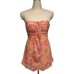 Floral strapless dress on a mannequin