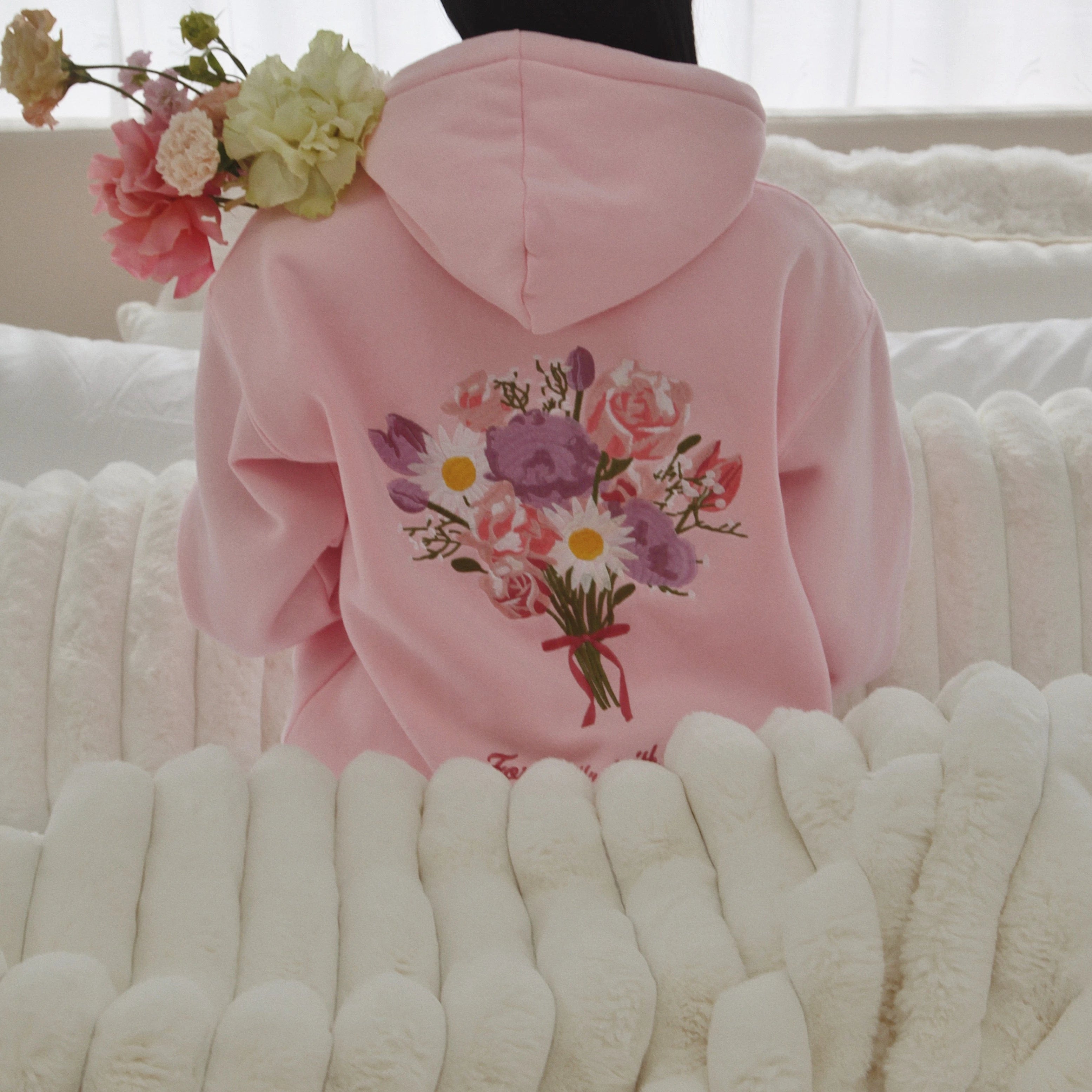 Pink hoodie with floral design