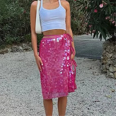 Women's radiant sequin midi skirt in pink, yellow, blue.