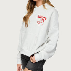 White hoodie with red graphic and text on a plain background