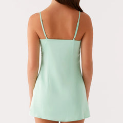 Light green slip dress worn by a person - back