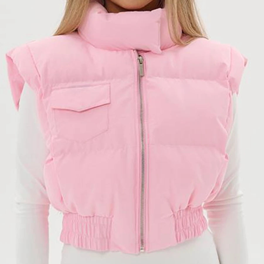 Pink puffer vest worn by a person