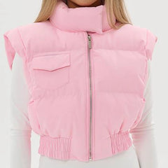 Pink puffer vest worn by a person