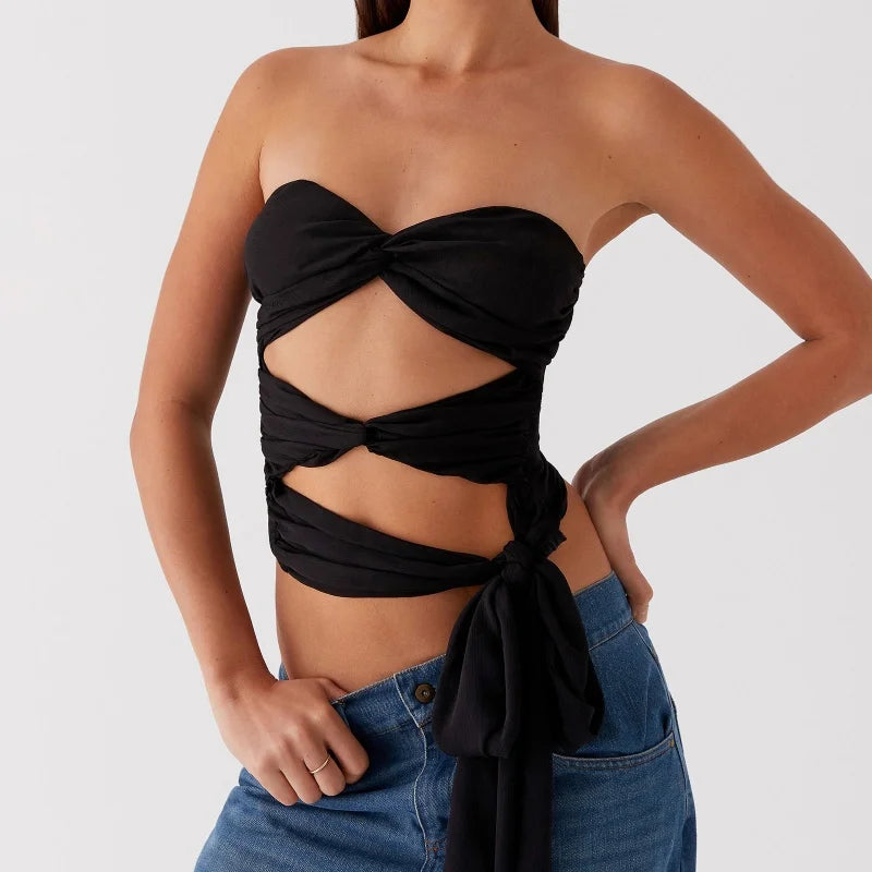 Women's edgy black strapless cutout crop top.