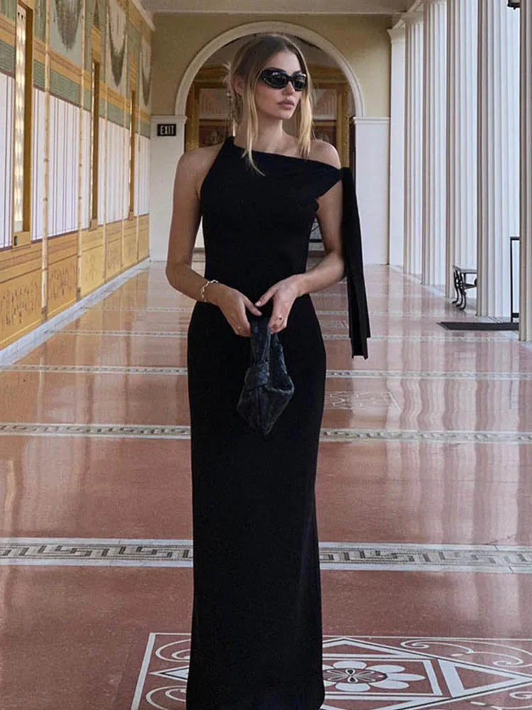 Women's one shoulder tie-up long dress with an asymmetrical neckline and fit-and-flare silhouette.