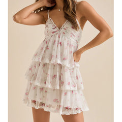 Woman wearing a floral tiered dress - side