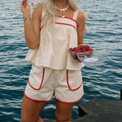 White Color Trim Shoulder Tie Peplum Top And Shorts Set