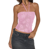 Pink floral strapless top worn by a person