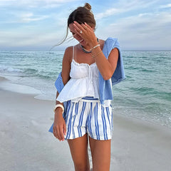 Women's multi-color elastic mid-waist shorts.