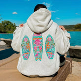 Women's surf board embroidered hoodie in a loose fit.