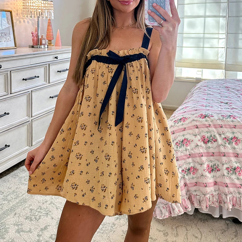 Women's tie-up ruffle print babydoll mini dress with square collar.